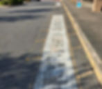 faded curb painting