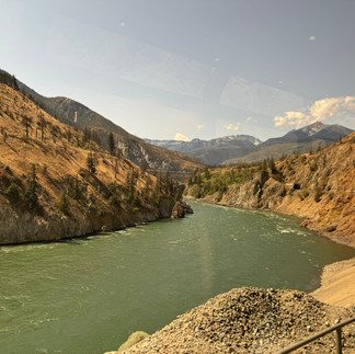 River cutting through desert like valley along the train route from Kamloops to Vancouver.