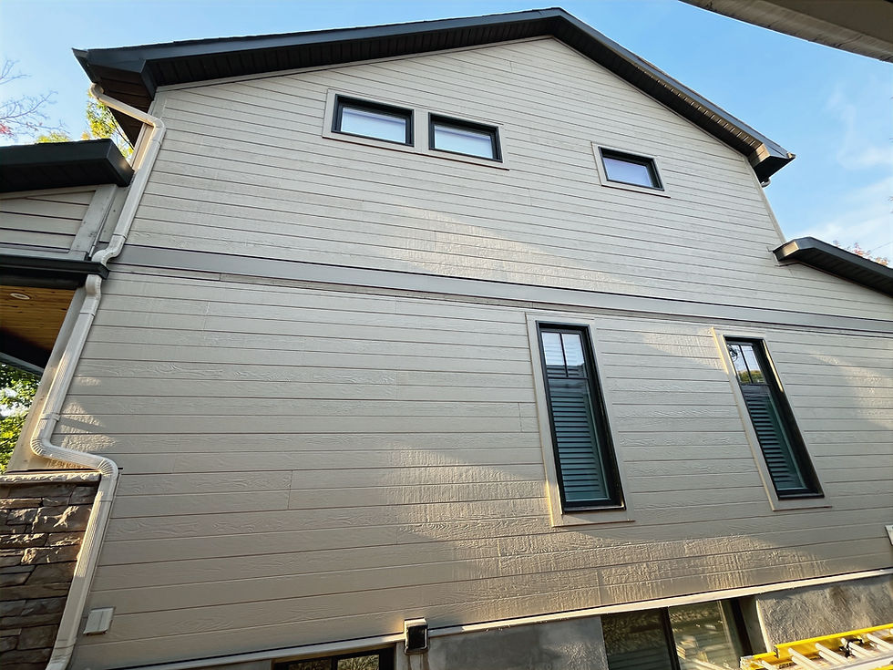 Eye-level view of Maibec CanExel siding on a modern home exterior