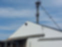 Grain Factory with white vinyl siding