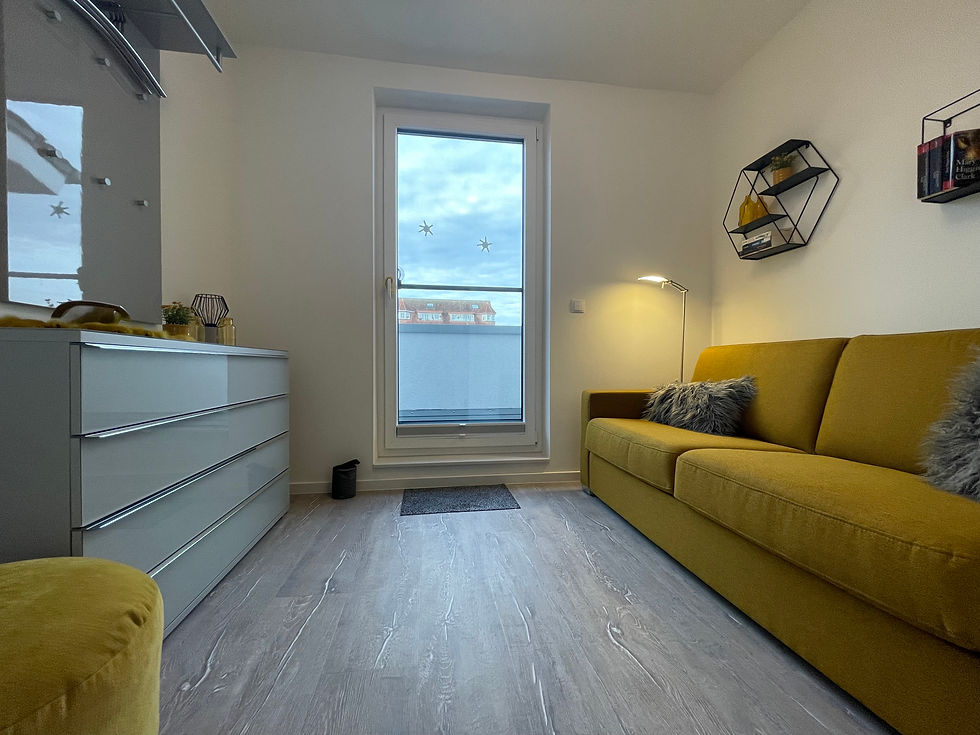 Gastzimmer mit Zugang zum kleinen Balkon