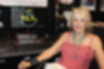 Radio presenter Sherrie sitting in 92.7FM studio