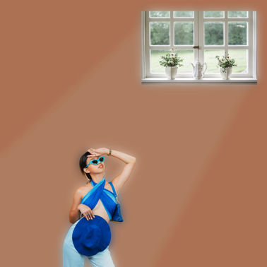 Girl Looking Up and Shielding Eyes