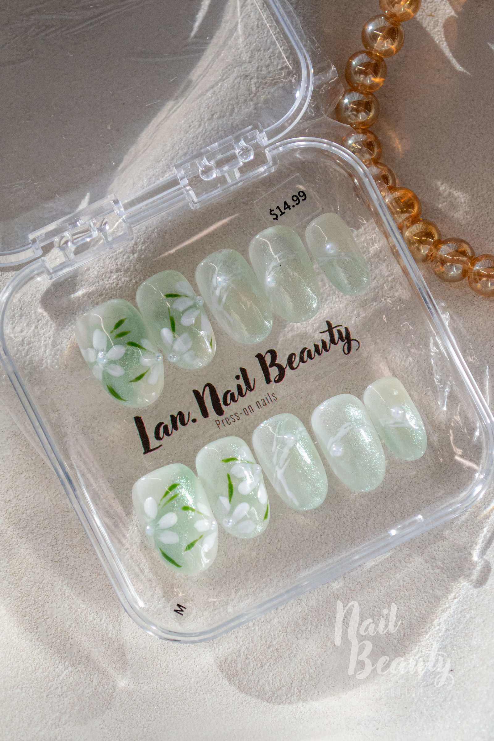O Press-on nail M
