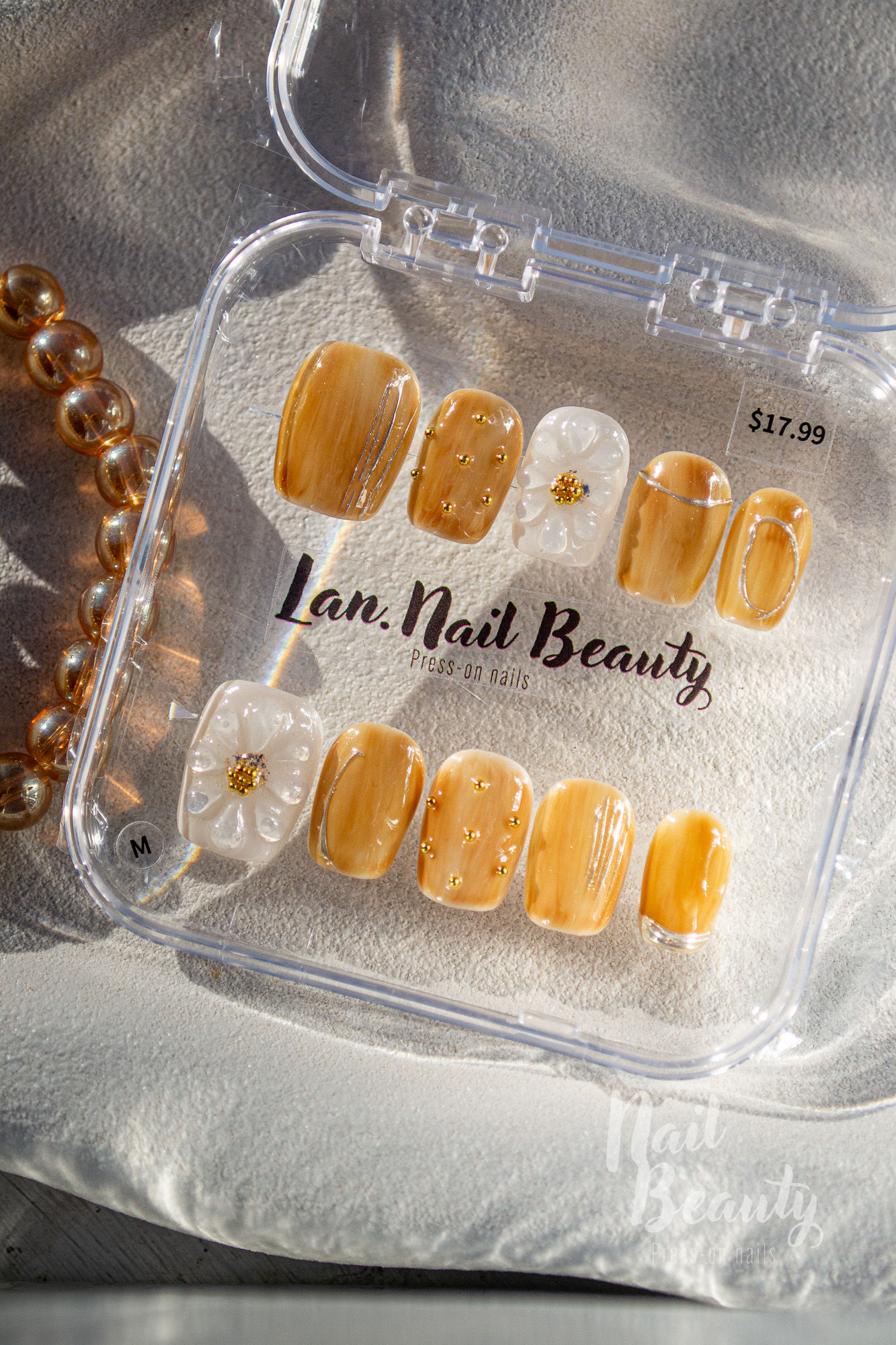 B Press-on nail M