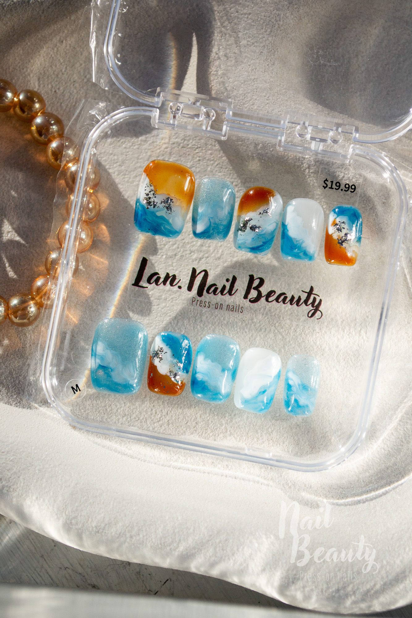 B Press-on nail M