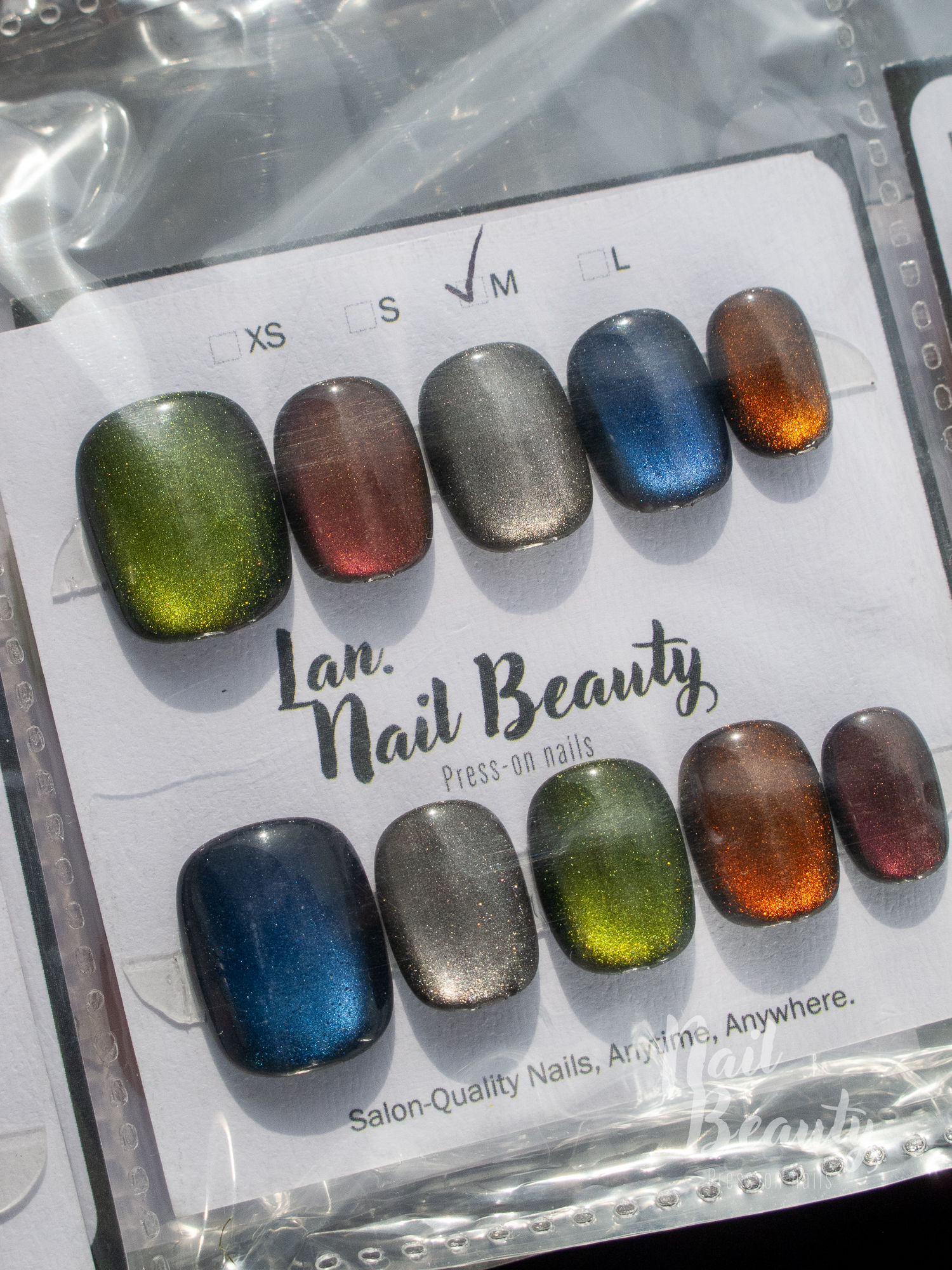 N Press-on nail M