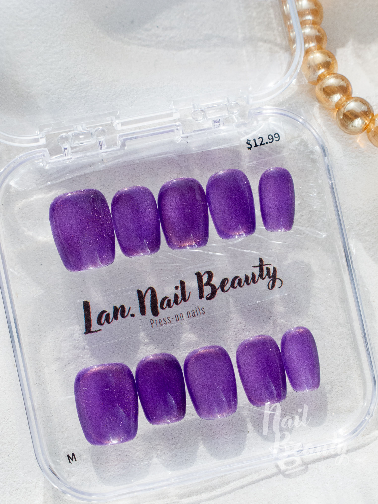 B Press-on nail M