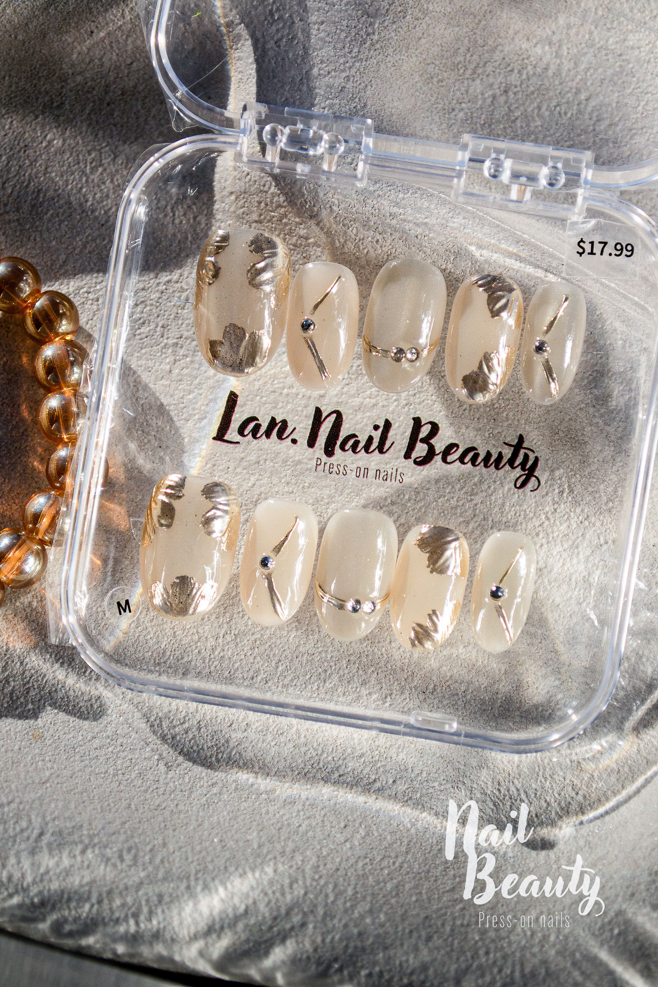 O Press-on nail M