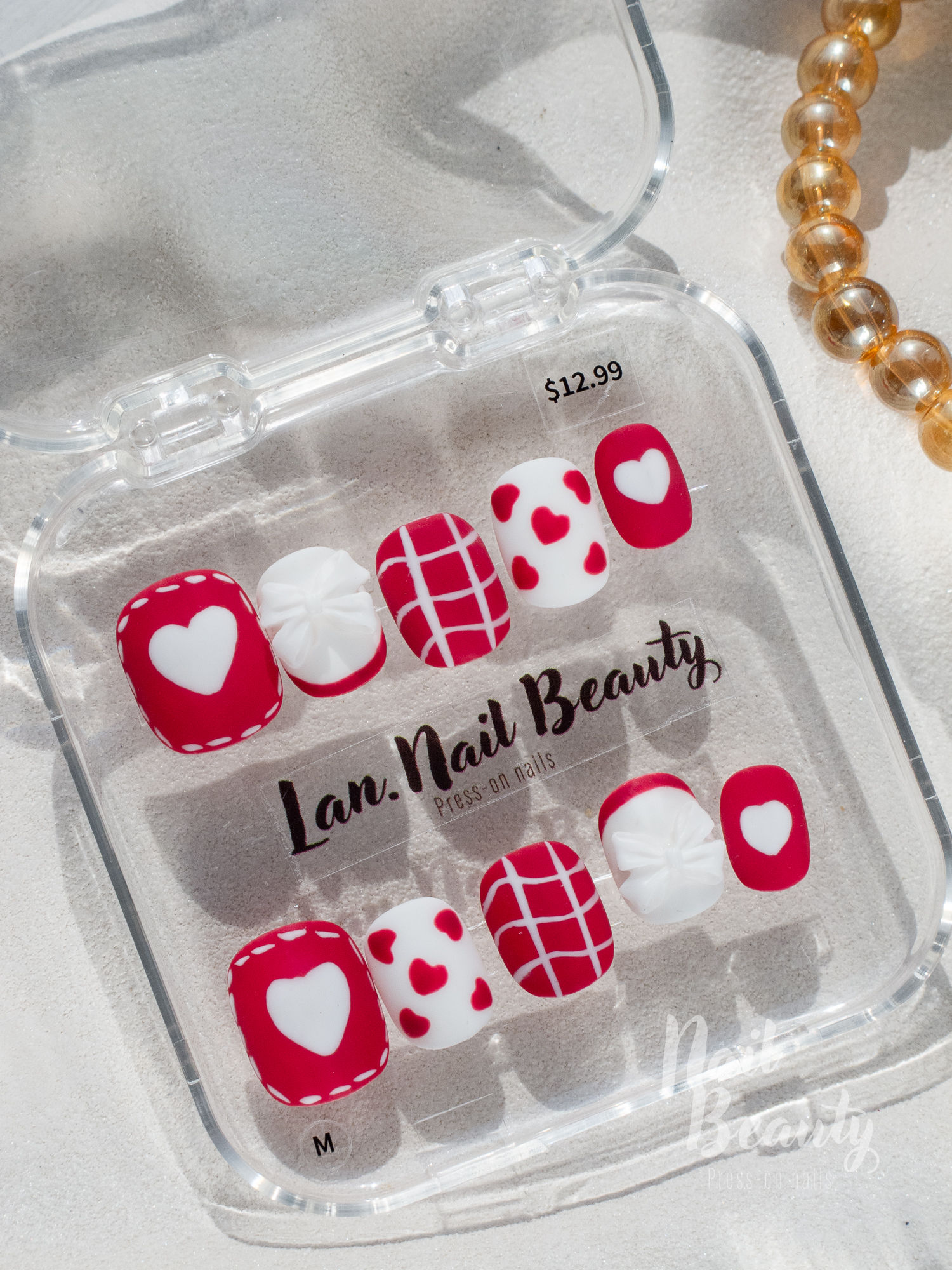 N Press-on nail M