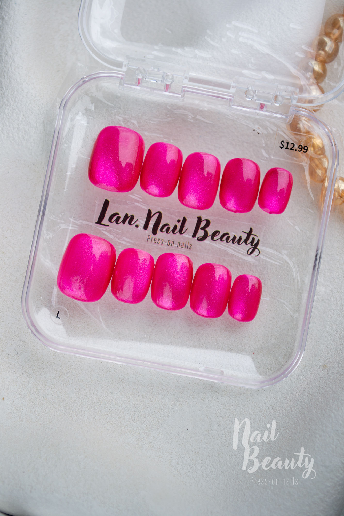 N Press-on nail L