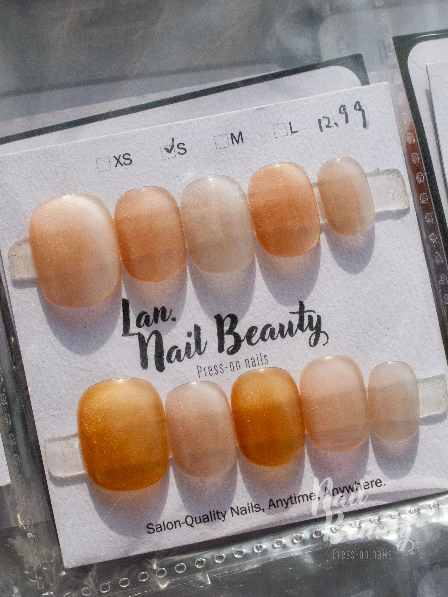 N Press-on nail S