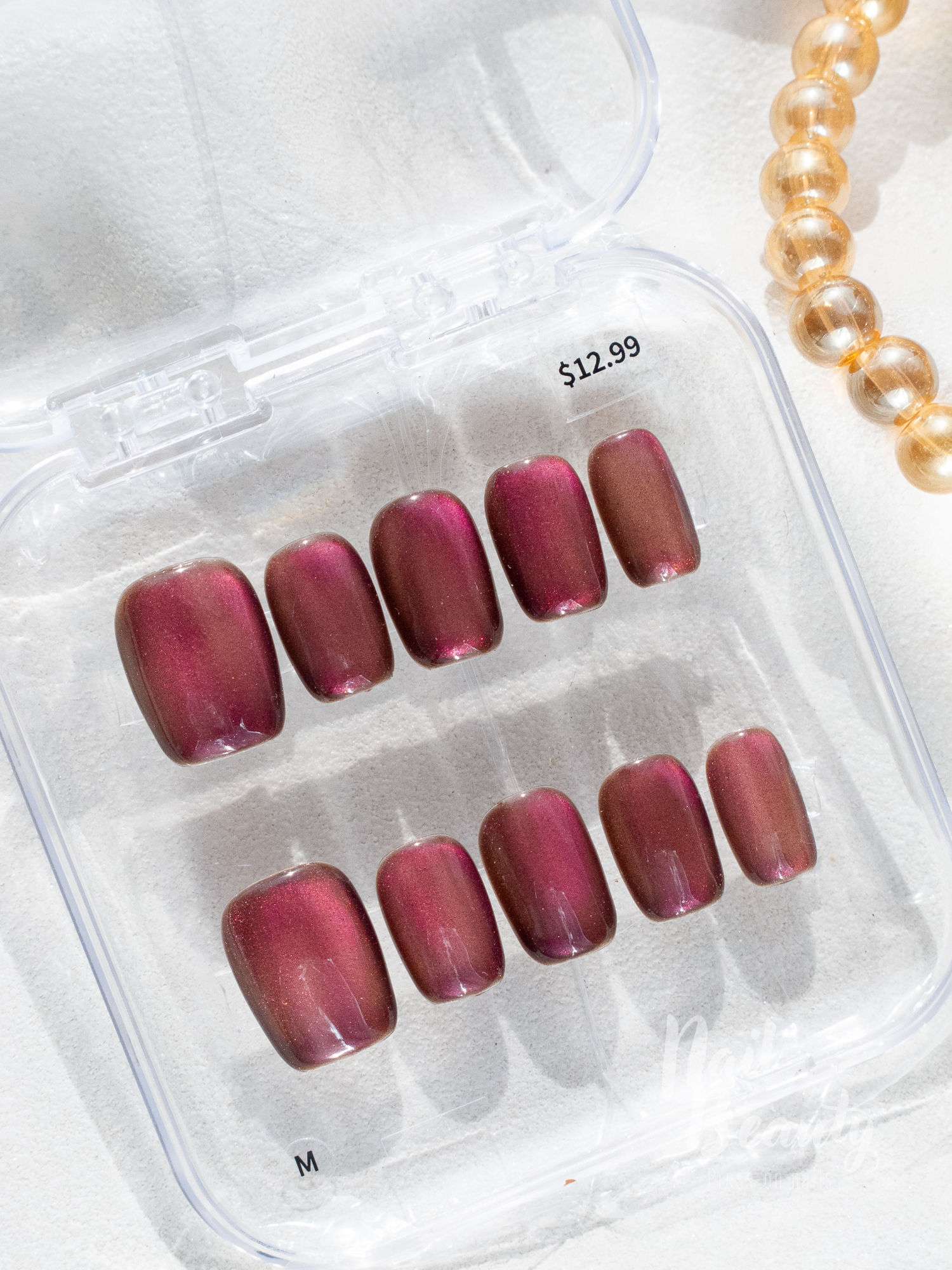 B Press-on nail M