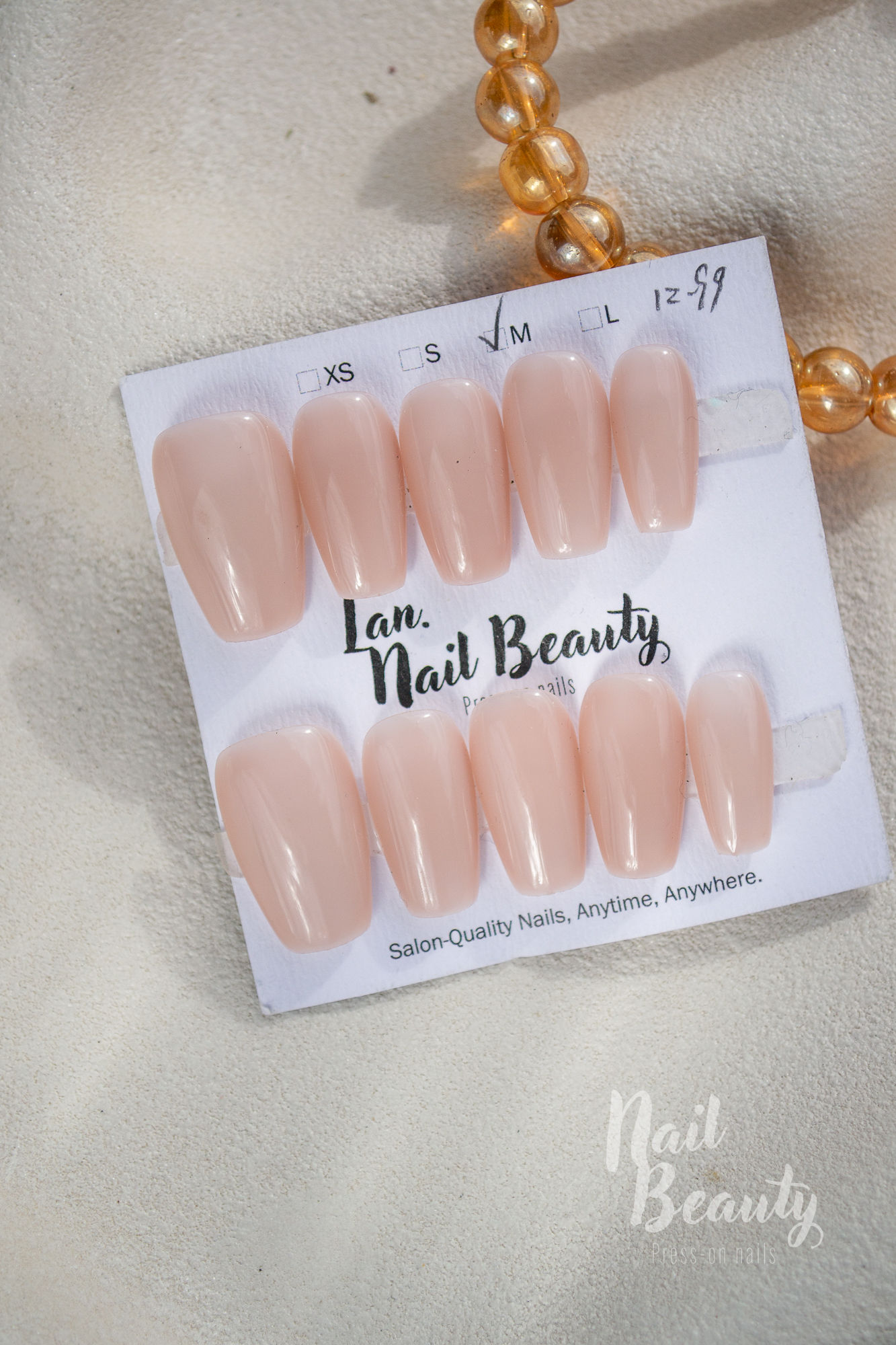 B Press-on nail M