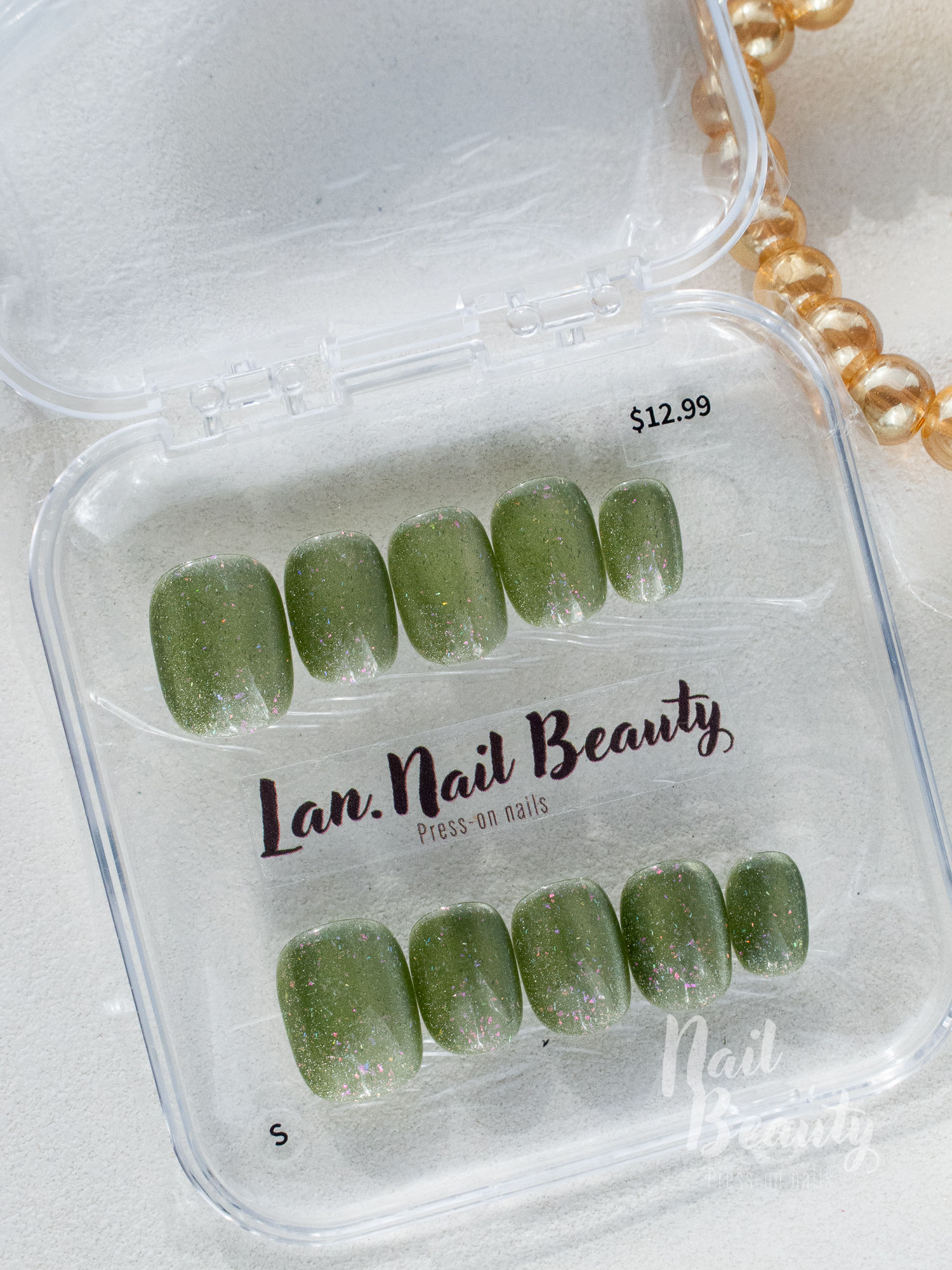 N Press-on nail S