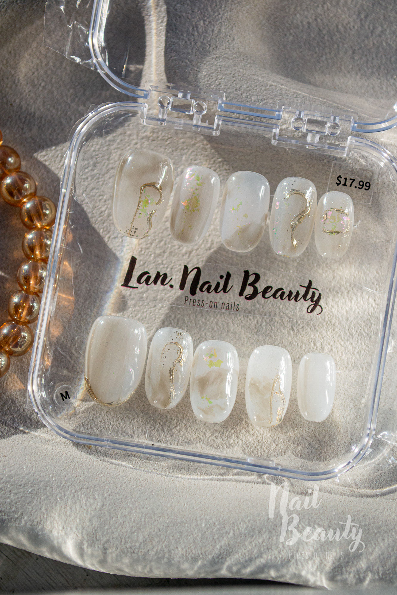O Press-on nail M