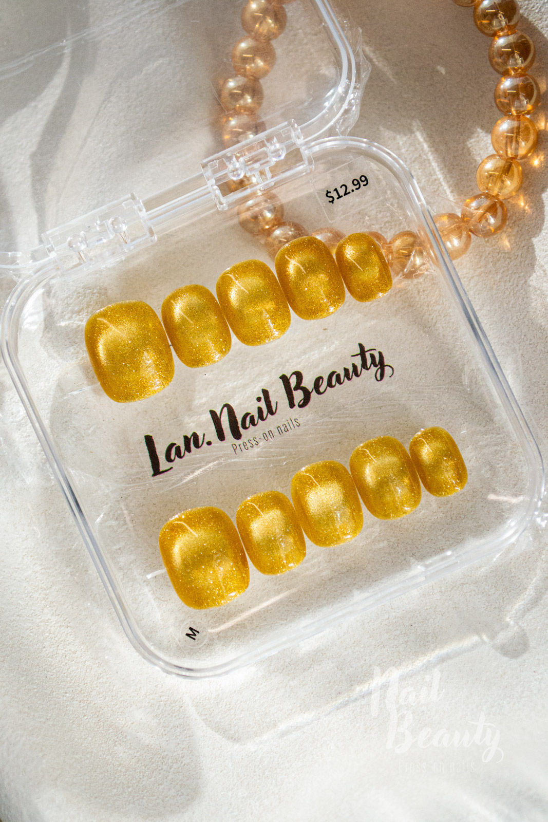 N Cat eye Light Press-on Nail M