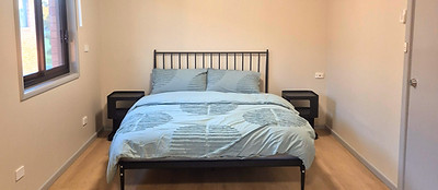 Spacious room with a large queen bed for couple or solo travellers