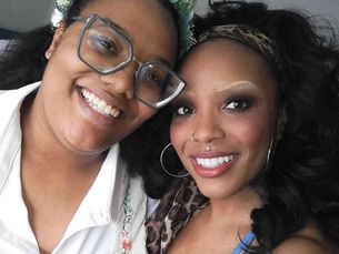 a picture of anjuli and her little sister. both are dressed exceptionally well for aforementioned sister's wedding.