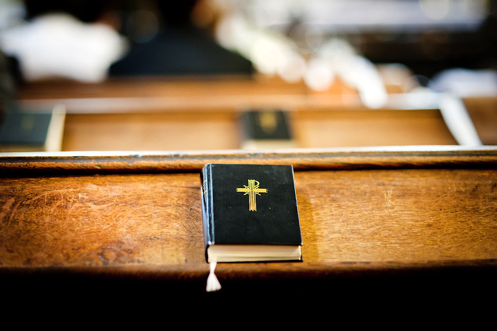 Still photo of bible put on wooden desk