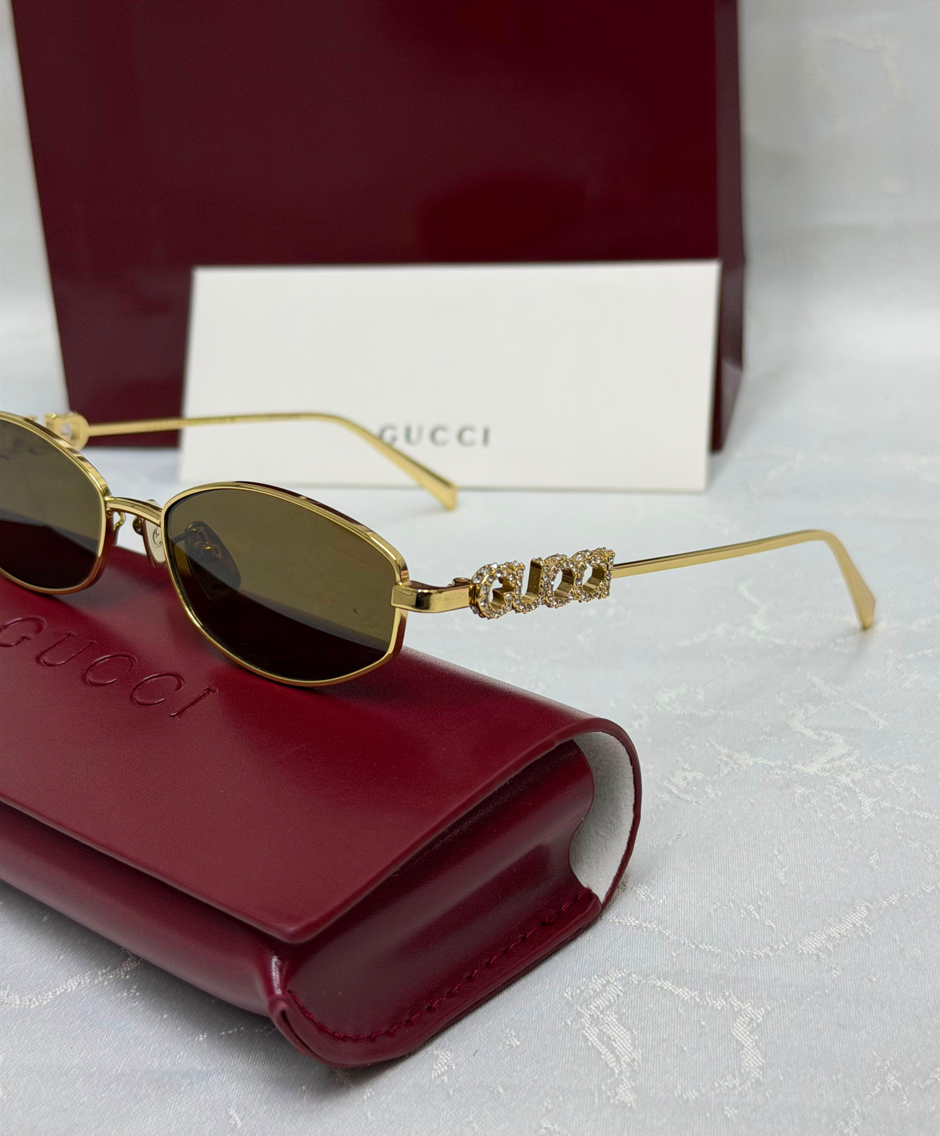 Gucci Oval-Frame Sunglasses 