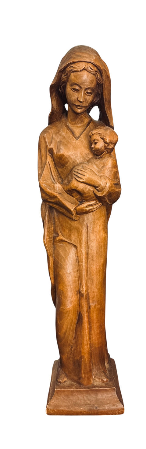 Hand-carved wooden Madonna and Child sculpture with warm natural finish.