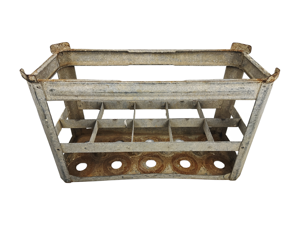 Angled view of vintage French bottle crate with metal dividers and rusted base
