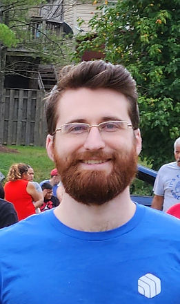 Peter_Smiling_Blue_Impact_Shirt.jpg