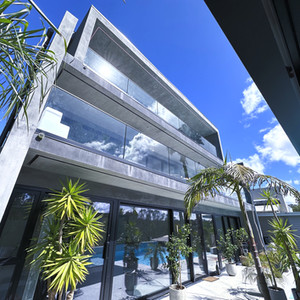 In-Situ Concrete Masonry Homes by Puddlefish Platt. Exterior View of Building Facade.