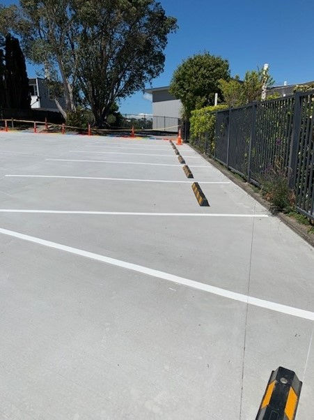 Land clearance, laying of new concrete carpark and pathway and new fencing installation at Milford School by Puddlefish Platt