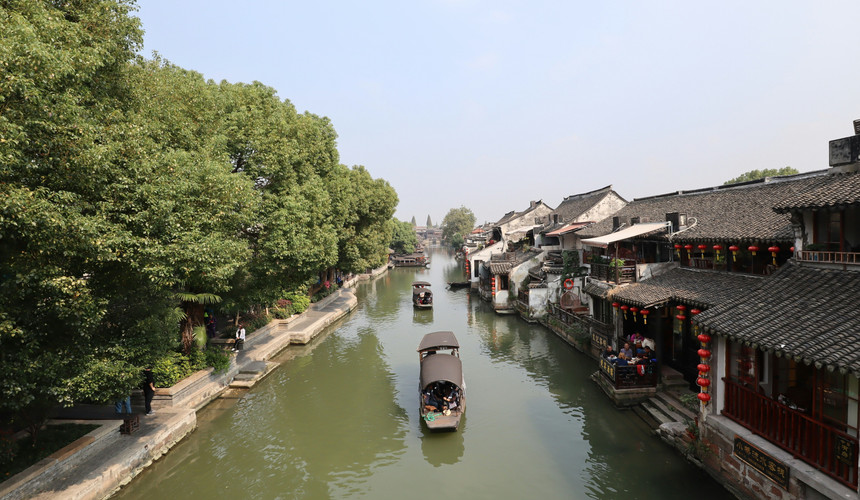 Unwind in the bewitching beauty and serenity of Xitang! Explore ancient lanes, tranquil canals, and cultural treasures in China's serene water town. Embrace the art of slow living and find peace in every step.