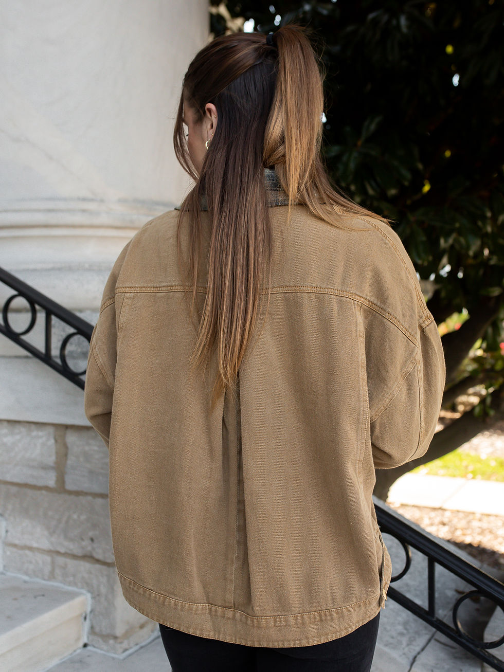 Thumbnail: Model wearing the Palmer Plaid Collar Jacket in Camel with washed cotton denim, a contrasting plaid collar, and black jeans.