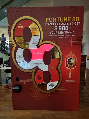 Interactive prize activation Singapore branded lucky draw experience for customer engagement