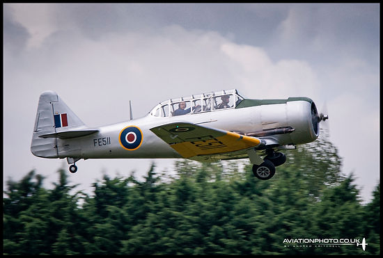 North American AT-16B Harvard MkIIB FE511 taking off with the author onboard