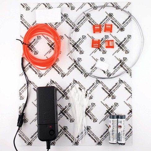 Neon line art acrylic STEM kit parts including LED circuits and materials