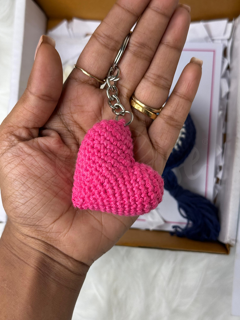 Handmade pink crochet heart keychain with metal ring, eco-friendly gift accessory