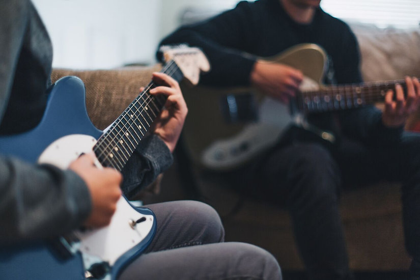 Image-of-young-boy-playing-electric-guitar-during-lesson_Alex-Williams-Music-School