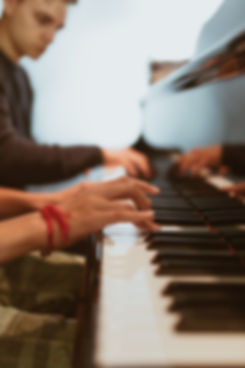 Alex-Williams-teaching-piano-to-his-student_Alex-Williams-Music-School.jpeg