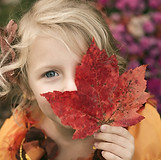 Child With Autumn Leaf_edited.jpg
