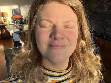 Steph with the sun and a smile on her face