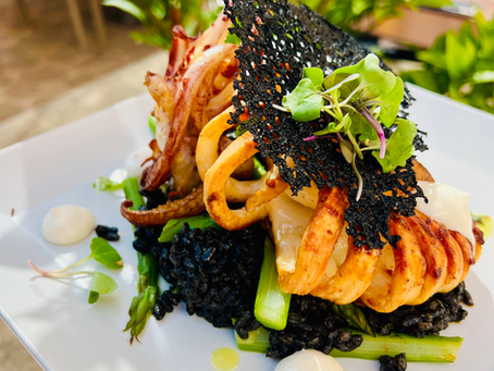 Calamaris with black inkt rice, gamba’s and  green asparagus,