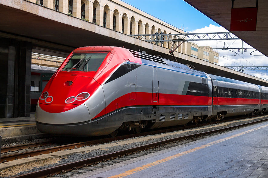 The train stops near the platform station in Italy.jpg