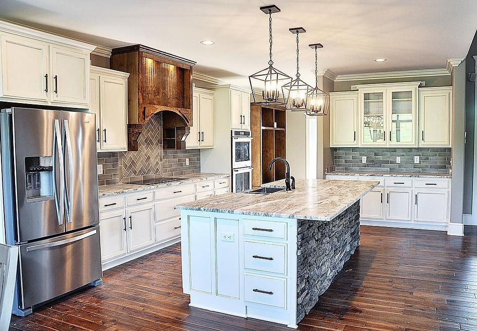 Light-filled kitchen featuring custom white perimeter cabinets and a rich wood island by Hartsville Cabinet & Millwork.