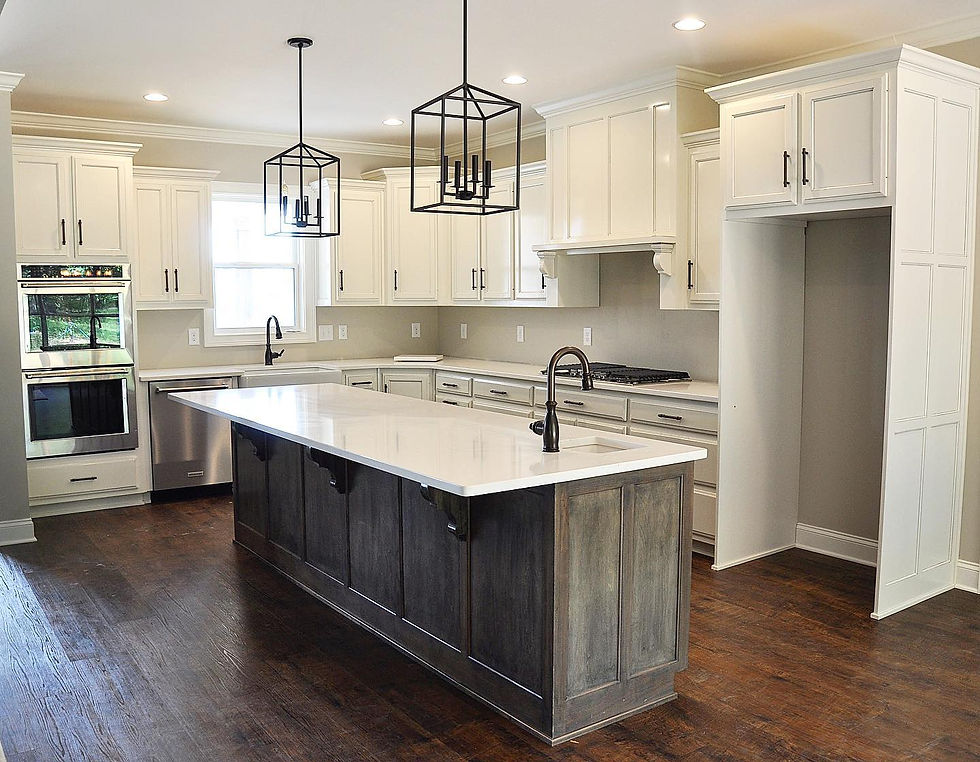 Transitional kitchen with two-tone cabinetry and craftsman-style island built in Middle Tennessee.
