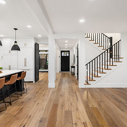 Modern Farmhouse Entryway and Kitchen Interior Design with hardwood floor and Black and White colors