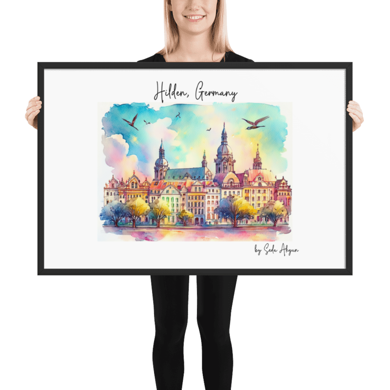 Framed Hilden Germany skyline watercolor art poster held by model – artwork by Seda Akgun