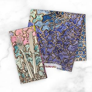 Kaleidoscape Napkins on Table with Silverware Spoon and Fork on it