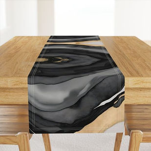 Table runner layered under decor pieces—Eclipse Veins Luxe design adding movement and artistic flair to dining space.