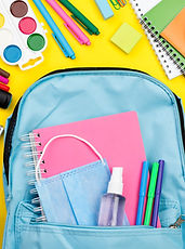 flat-lay-school-essentials-with-multicolored-pencils-backpack.jpg