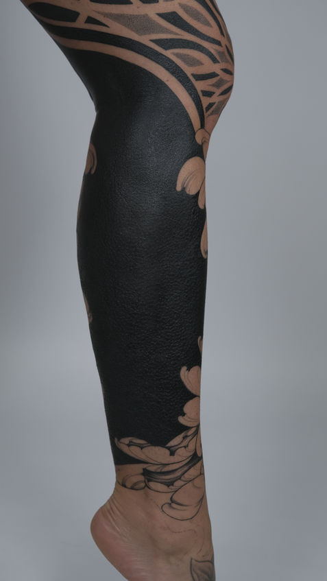 Tattoo on the leg.